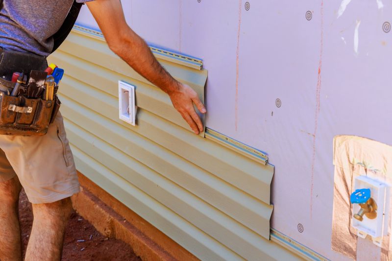 Professional Installing Vinyl Siding